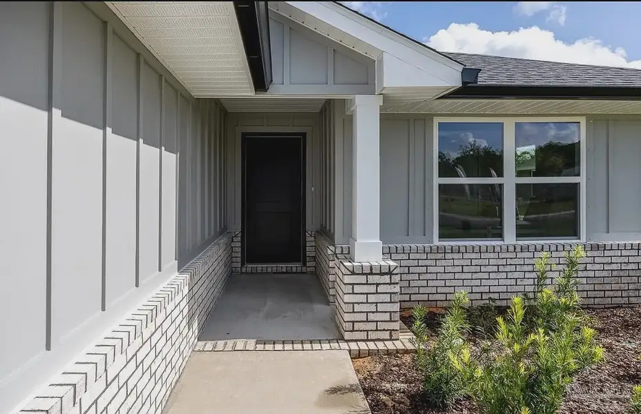 Exterior details and patio area of a home in Hidden Pines, Milton (Image 2). Exterior details and patio area of a home in Hidden Pines, Milton (Image 2).