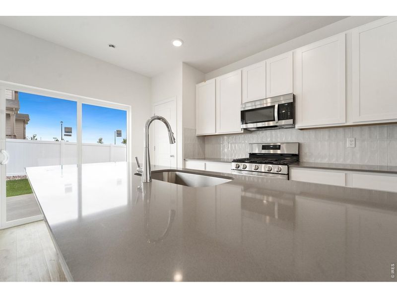 Furnished interior view inside a new home in Union Colony West, Greeley (Image 8).