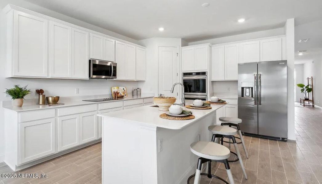 Furnished interior view inside a new home in Edenbrooke at Hyland Trail | 55+: Edenbrooke at Hyland Trail 60s, Green Cove Springs (Image 6).