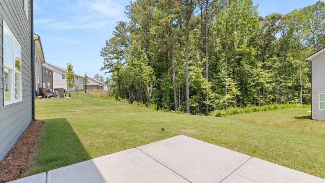 Exterior details and patio area of a home in Northwoods at Mirror Lake, Villa Rica (Image 4).