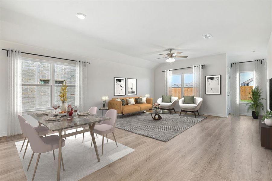 Living room featuring light wood-type flooring and ceiling fan