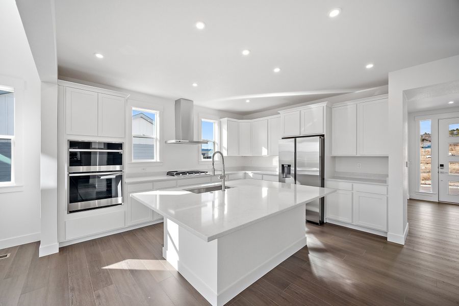 Representative furnished interior of a home built from the Qwynn by Lokal Homes in Jackson Creek, Monument (Image 5).