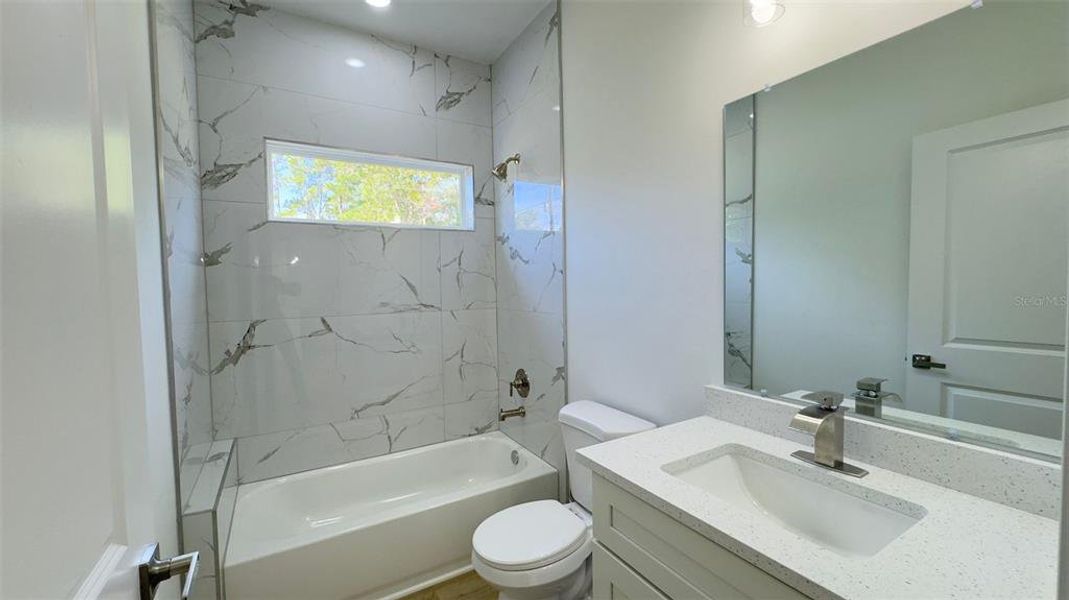 Furnished interior view inside a new home in , Dunnellon (Image 8).