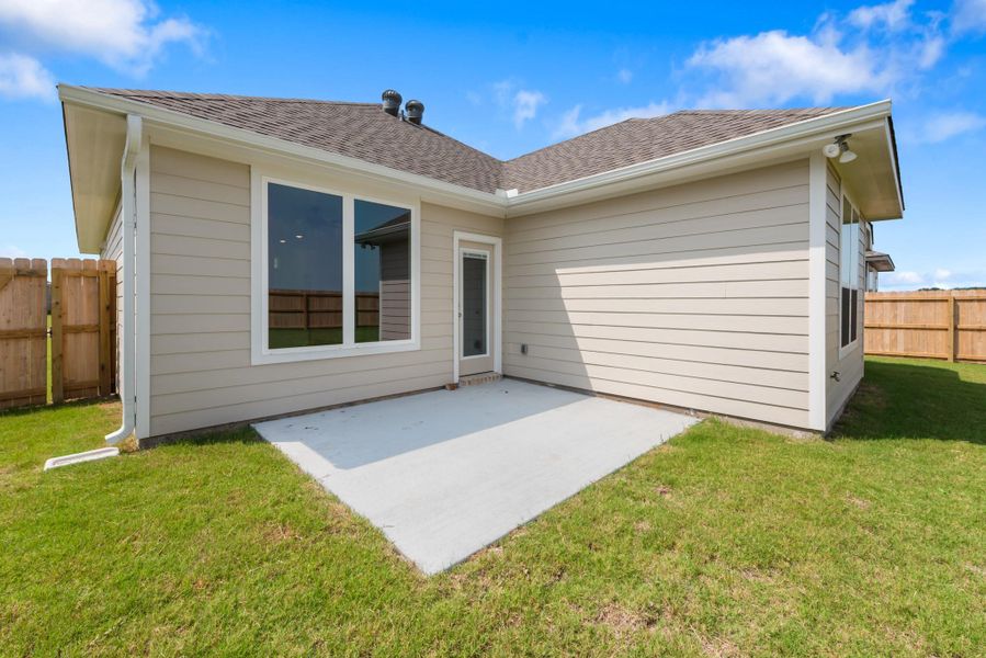 Front exterior of a new home in , Snook, TX, highlighting curb appeal (Image 17). Front exterior of a new home in , Snook, TX, highlighting curb appeal (Image 17).