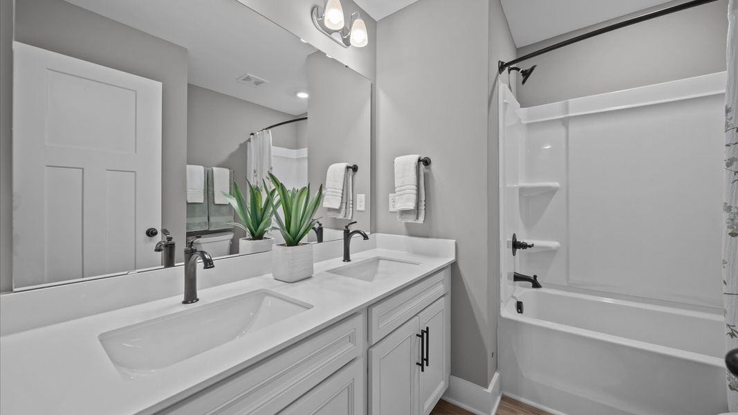 Furnished interior view inside a new home in Clayton Crossing, Arden (Image 13).