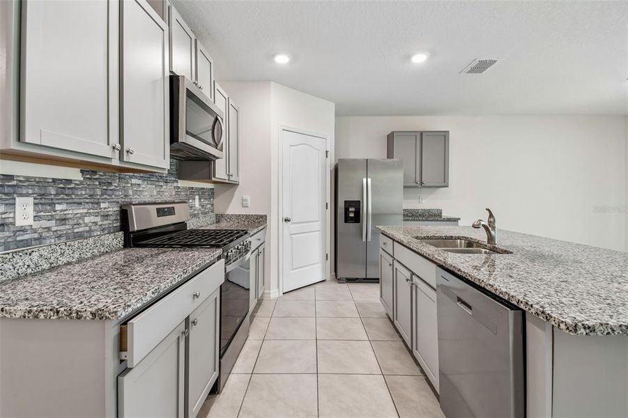 Furnished interior view inside a new home in Riviera Bella, Debary (Image 11).