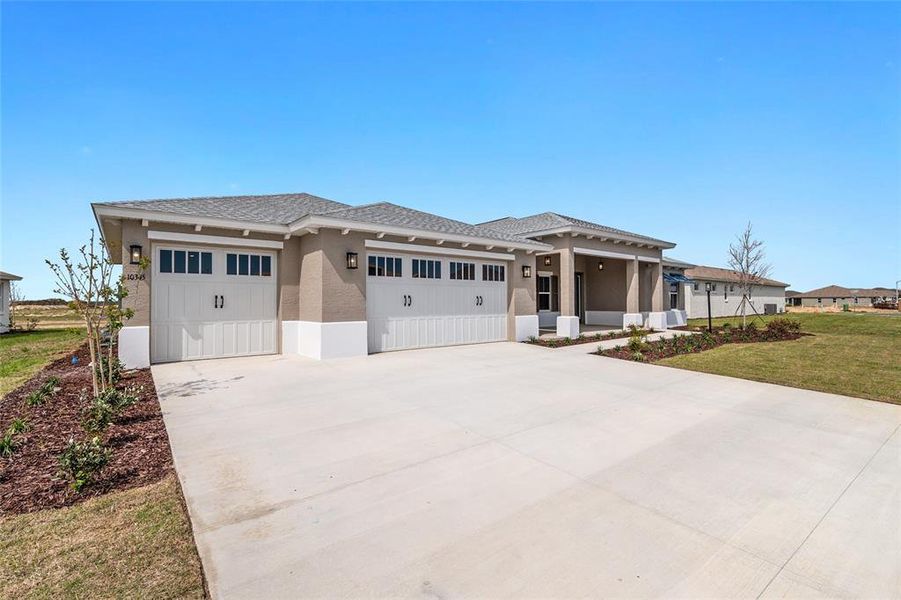 Front exterior of a new home in , Ocala, FL, highlighting curb appeal (Image 25).