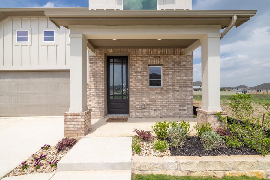 Exterior details and patio area of a home in Santa Rita Ranch, Liberty Hill (Image 3).
