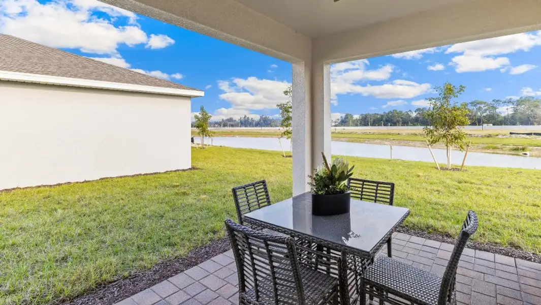 Exterior details and patio area of a home in Bentley Crossing, Fort Myers (Image 2). Exterior details and patio area of a home in Bentley Crossing, Fort Myers (Image 2).