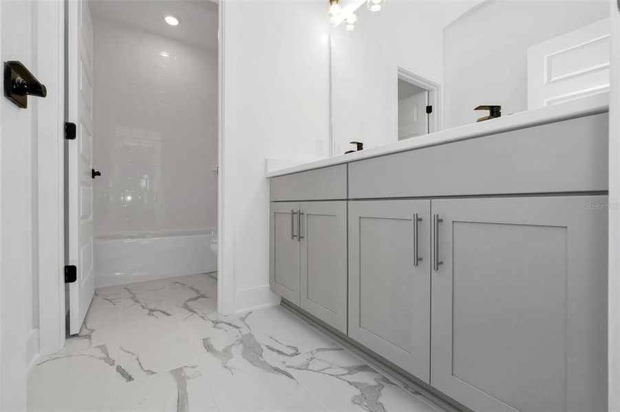 Furnished interior view inside a new home in Northlake At Ovation, Winter Garden (Image 11).