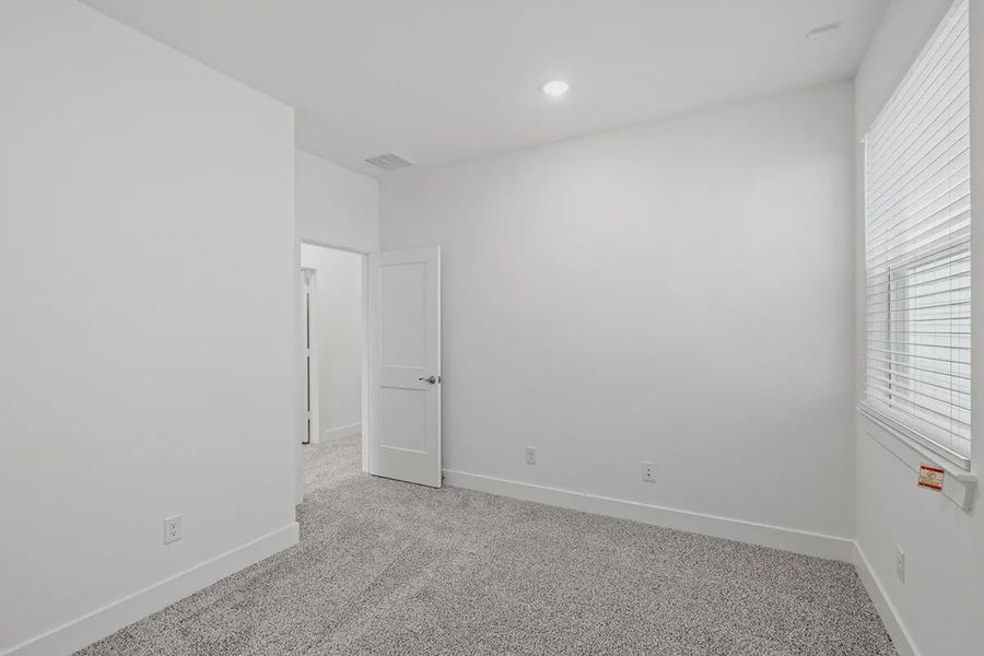 Spacious, unfurnished interior of a new home in Bridgeland Chateaus, Cypress (Image 24).