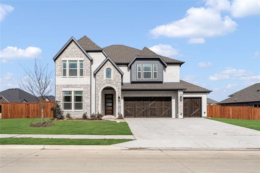 Front exterior of a new home in Sutton Fields, Celina, TX, highlighting curb appeal (Image 21).