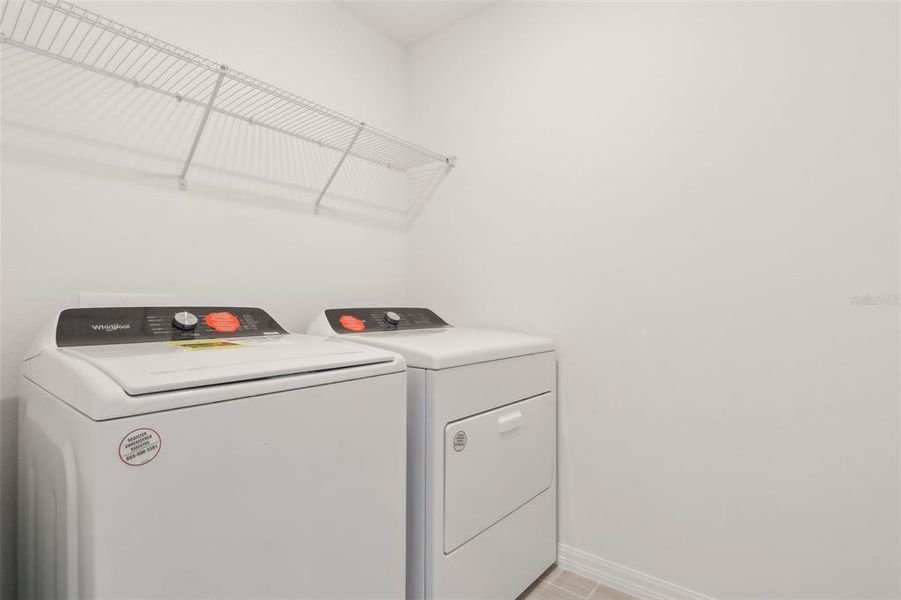 Furnished interior view inside a new home in The Meadow at Crossprairie Townes, St. Cloud (Image 11).