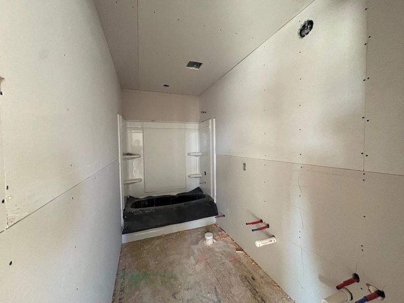 In-progress construction of a new home in Rolling Glen, Hutto, TX (Image 26).