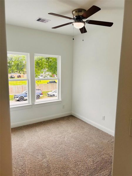 The third bedroom is spacious with views over looking the front strret.