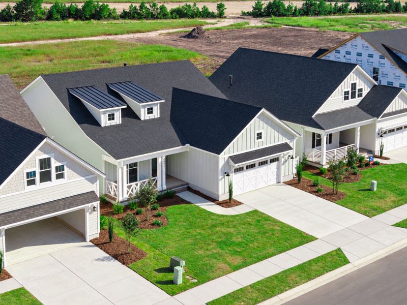 Front exterior of a new home in Sidbury Landing, Wilmington, NC, highlighting curb appeal (Image 29).
