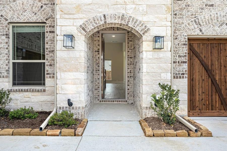 Exterior details and patio area of a home in Hayes Crossing, Midlothian (Image 3).