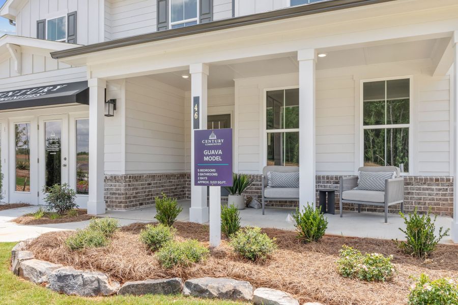 A sign in front of a building. A sign in front of a building.