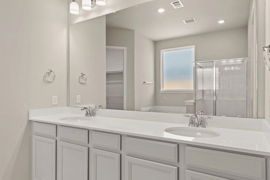 Primary bath. Note: Sample product photo. Actual exterior and interior selections may vary by homesite. Photo may be virtually staged