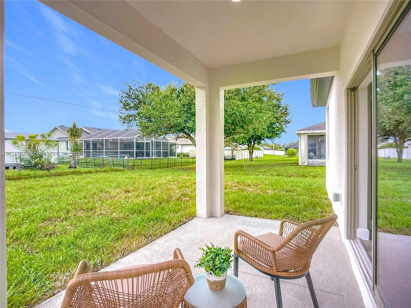 Exterior details and patio area of a home in , North Port (Image 20).