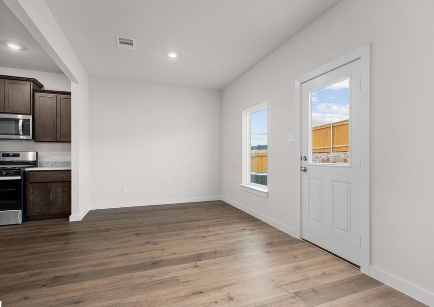 The dining room has a large window that lets in great, natural light. The dining room has a large window that lets in great, natural light.