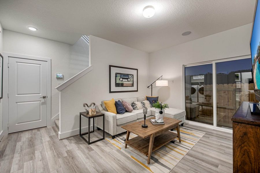 Representative furnished interior of a home built from the Calypso – HD by Chesmar Homes in Prominence, San Antonio (Image 13).