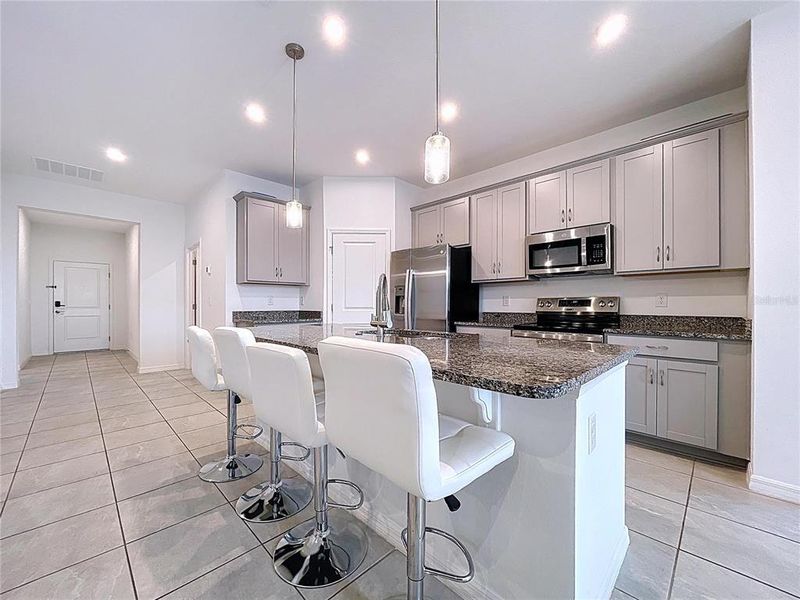 Furnished interior view inside a new home in Covered Bridge at Liberty Bluff, Haines City (Image 35).