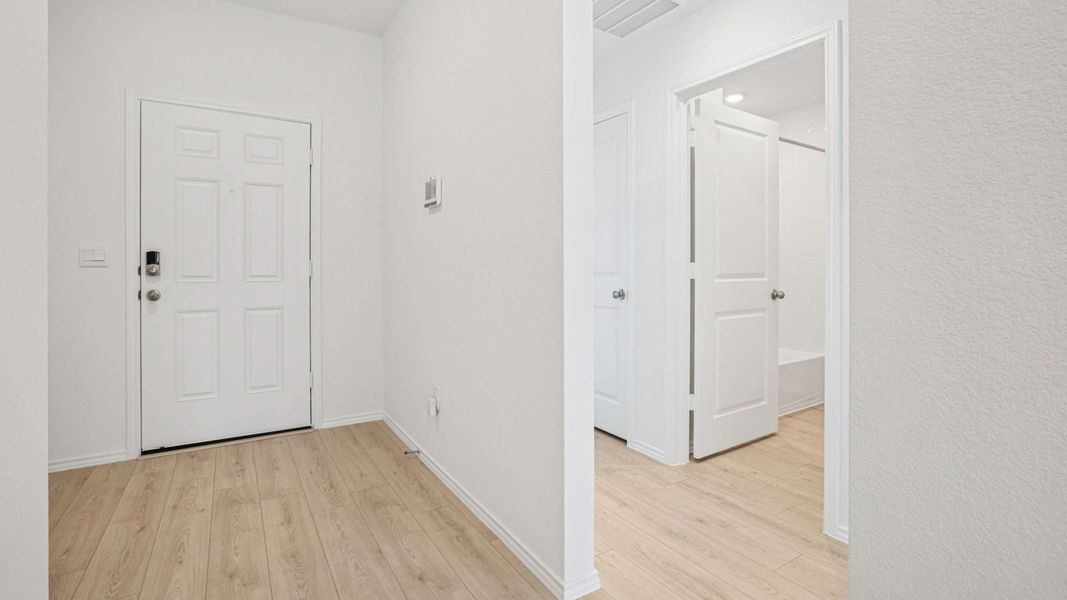 Spacious, unfurnished interior of a new home in Carillon, Manor (Image 11).