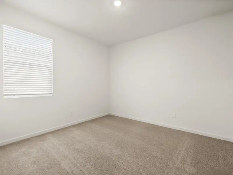 Spacious, unfurnished interior of a new home in Entrada Reserve Series, Tolleson (Image 14).