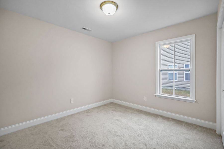 Spacious, unfurnished interior of a new home in Davenport Farms, Winterville (Image 36).