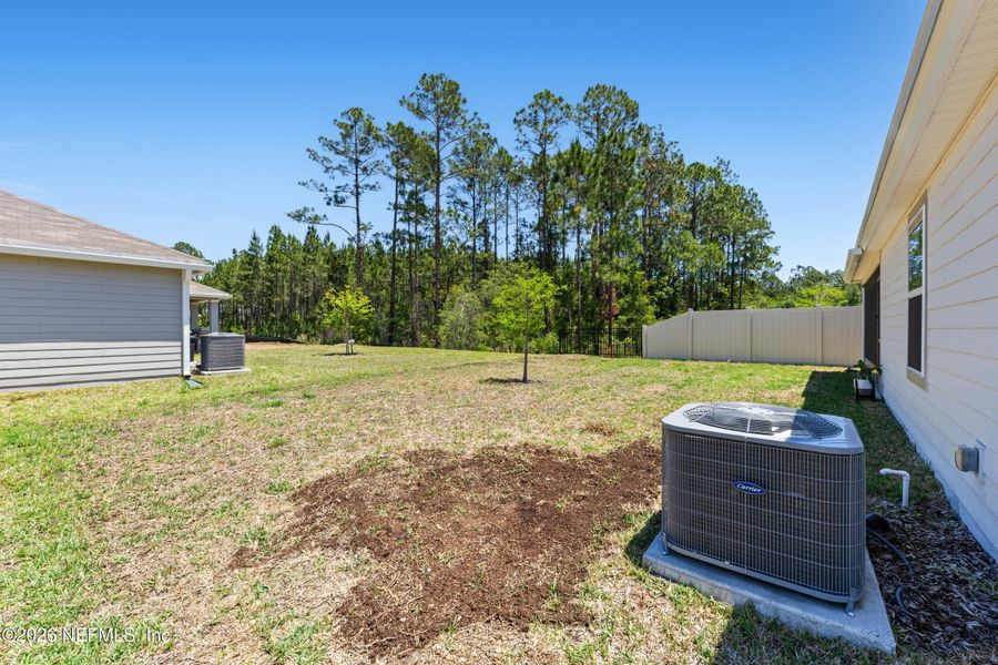 Exterior details and patio area of a home in Copper Ridge, Jacksonville (Image 28).