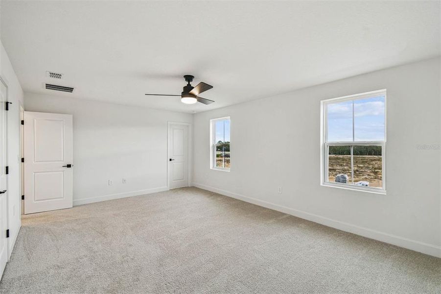 Spacious, unfurnished interior of a new home in Aspire at Canter Creek, Davenport (Image 21).