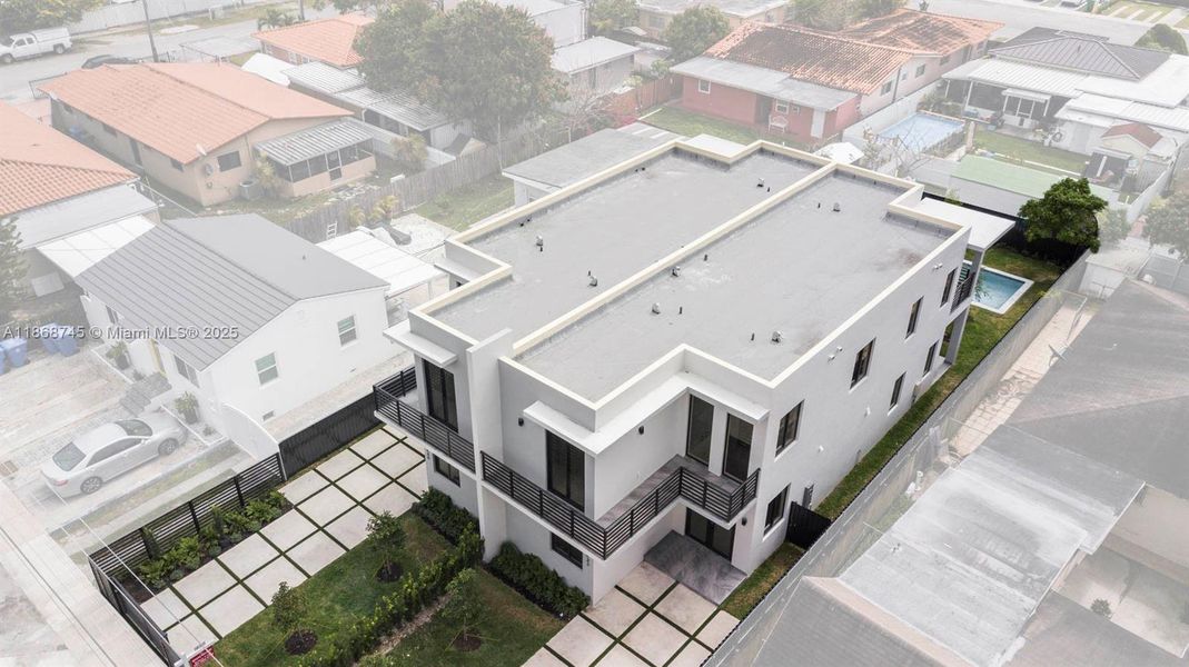 Front exterior of a new home in , Miami, FL, highlighting curb appeal (Image 22).