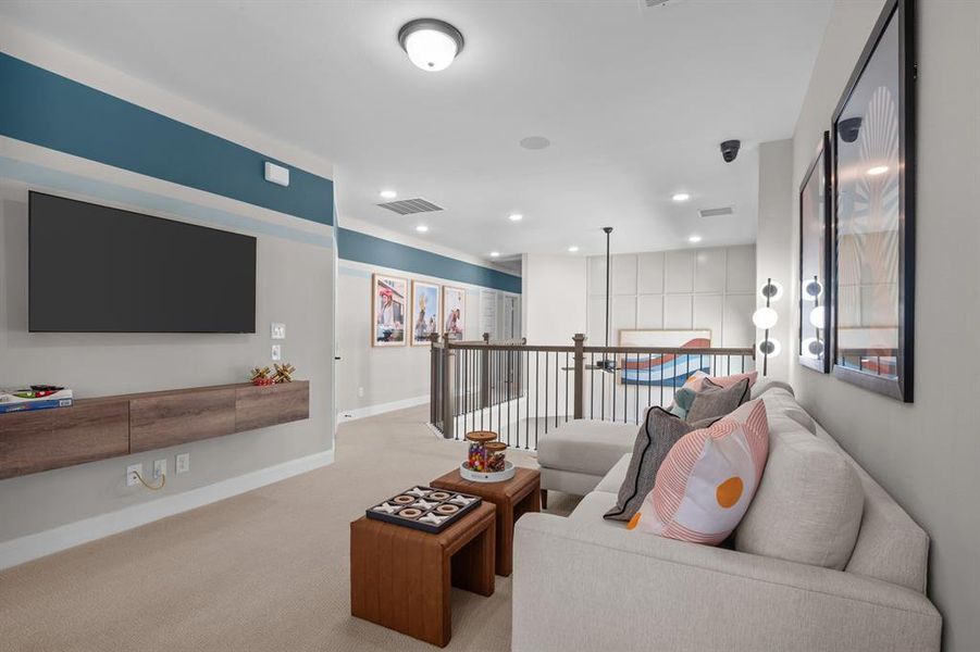 Living room featuring carpet flooring and recessed lighting