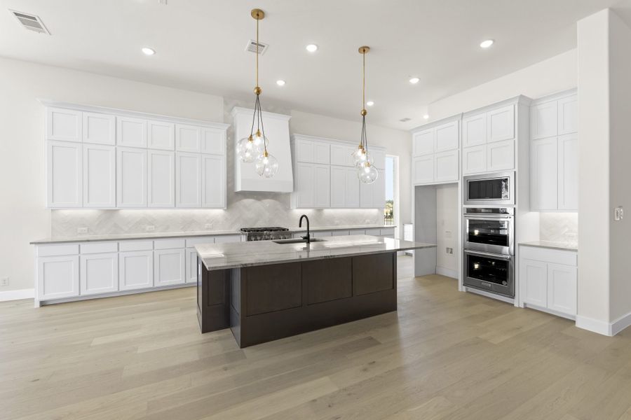 Representative furnished interior of a home built from the 5551 by Tradition Homes in Windsong Ranch, Prosper (Image 7).