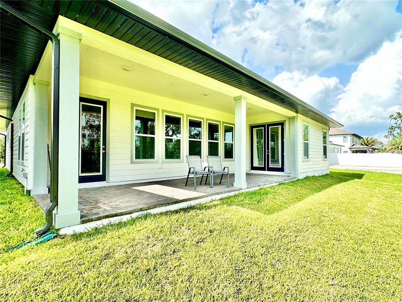 Exterior details and patio area of a home in Northlake Traditional, Winter Garden (Image 27). Exterior details and patio area of a home in Northlake Traditional, Winter Garden (Image 27).