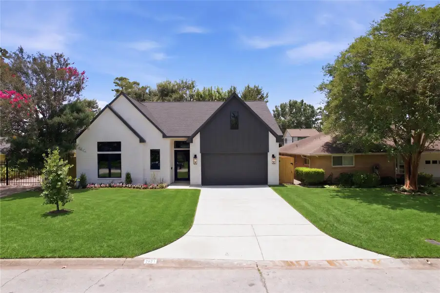 Located in the heart of Oak Forest, this exceptional residence places you minutes from Houston’s top dining, shopping, and entertainment destinations. Landscaping digitally edited.