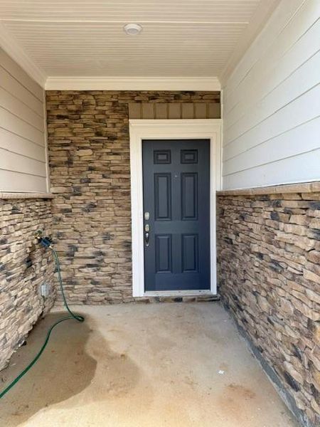 Exterior details and patio area of a home in Park Center Pointe, Mableton (Image 3).