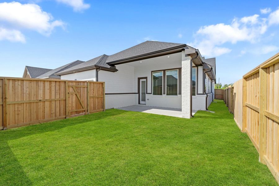Front exterior of a new home in Riceland, Mont Belvieu, TX, highlighting curb appeal (Image 14).