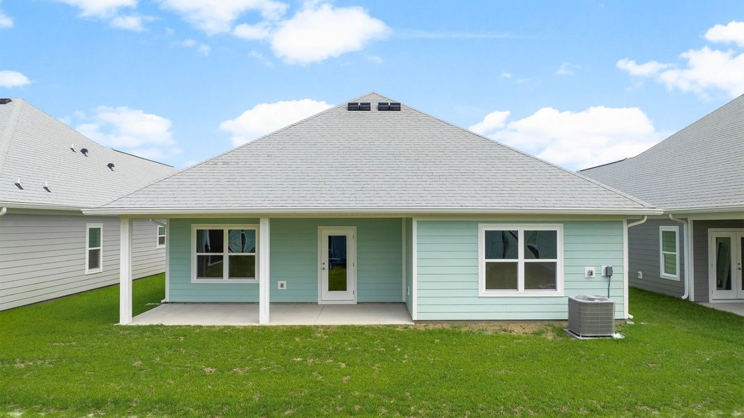 Exterior details and patio area of a home in WindMark Beach, Port Saint Joe (Image 4).
