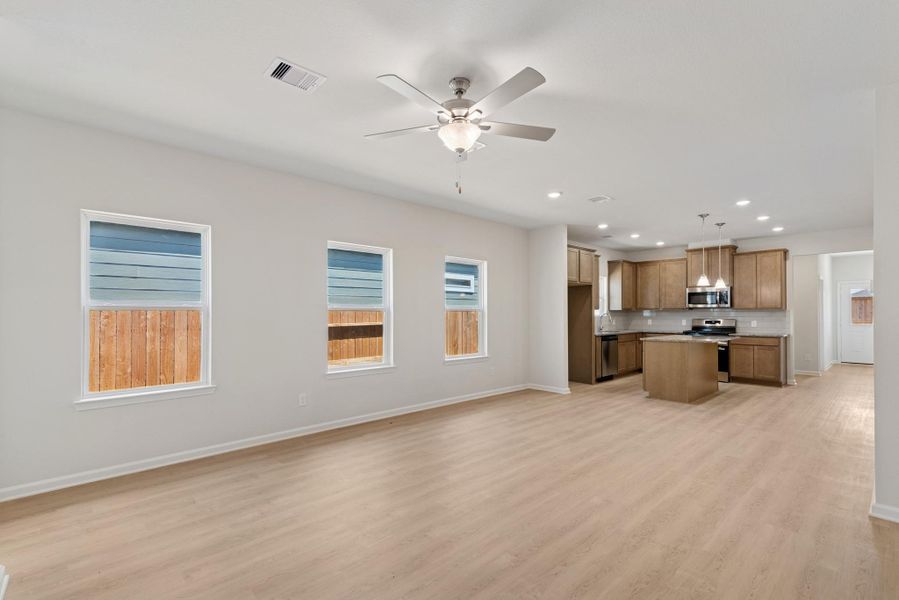 The Mockingbird II- Family Room into the Kitchen The Mockingbird II- Family Room into the Kitchen