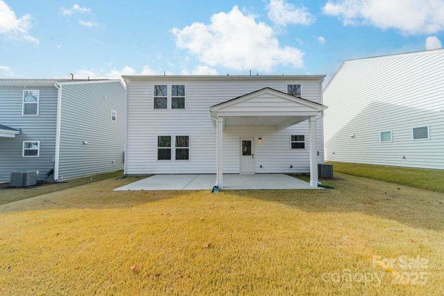 Exterior details and patio area of a home in Stewarts Landing, Charlotte (Image 22).