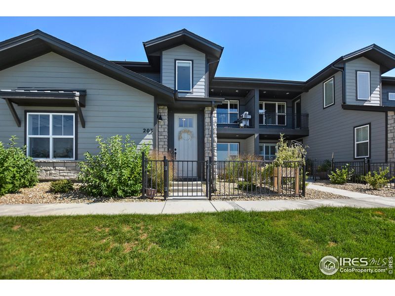 Front exterior of a new home in , Timnath, CO, highlighting curb appeal (Image 19).
