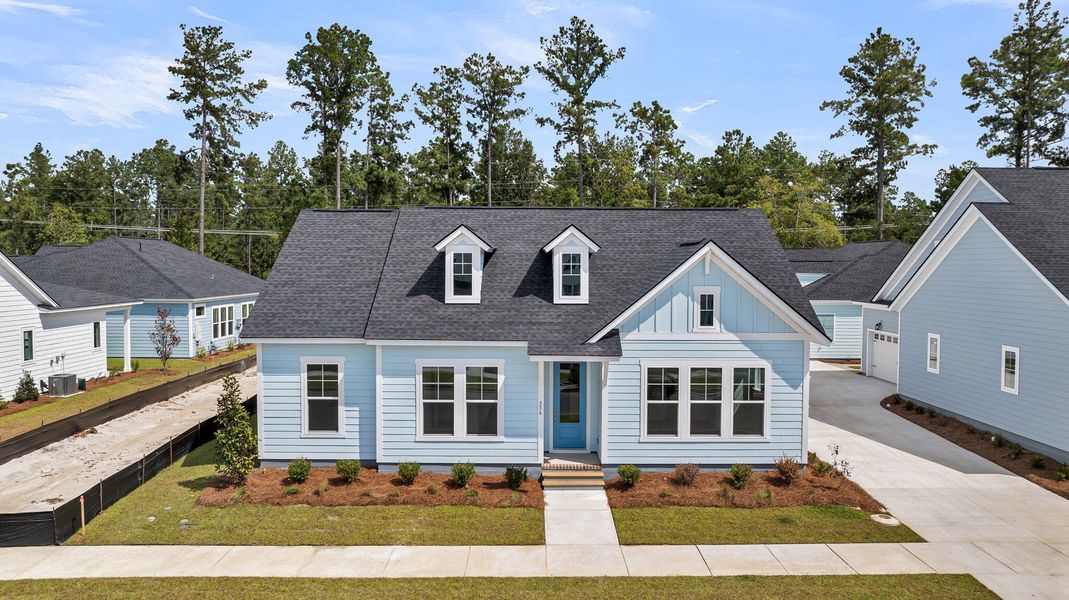 Front exterior of a new home in Nexton – Midtown – The Garden Collection, Summerville, SC, highlighting curb appeal (Image 2).