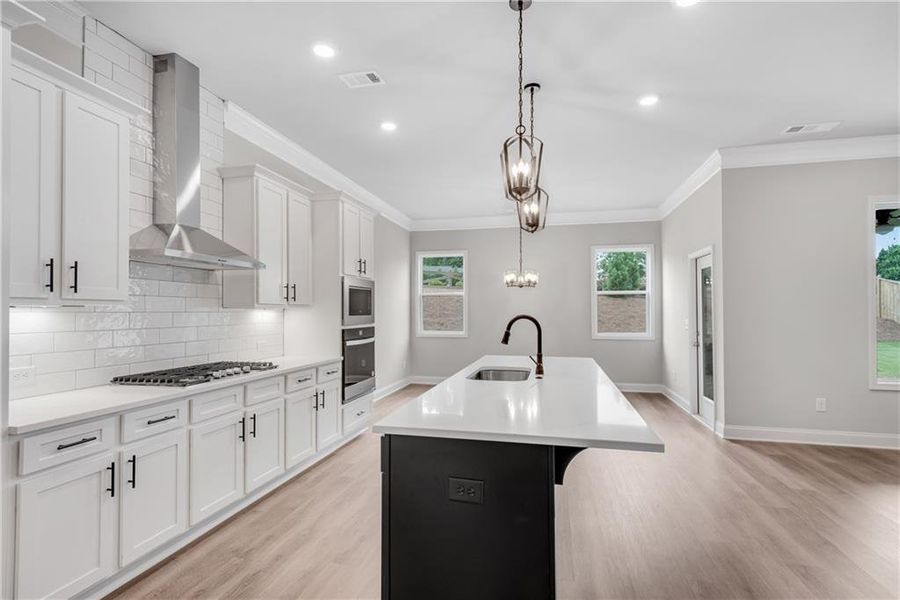 Furnished interior view inside a new home in Hidden Fields, Hoschton (Image 6).