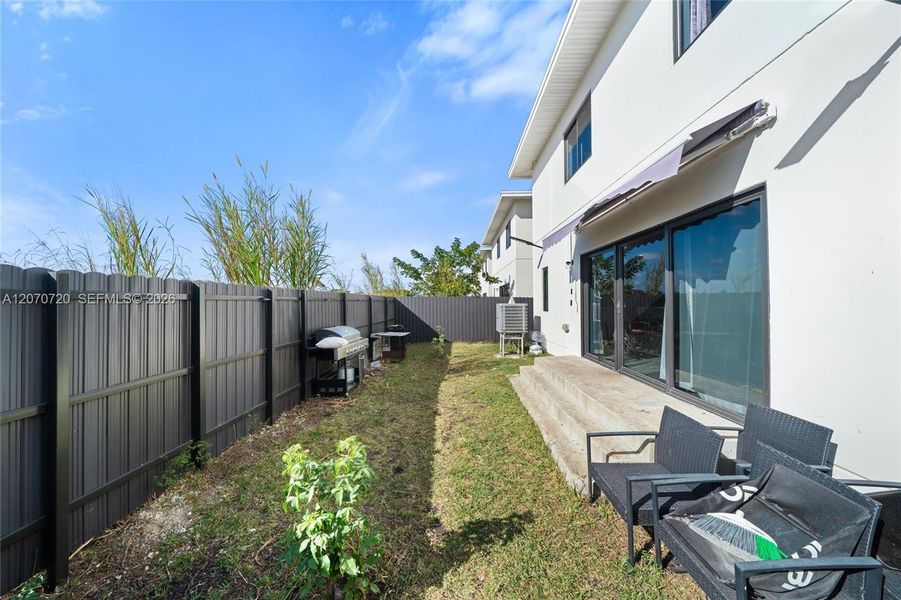 Exterior details and patio area of a home in , Florida City (Image 3). Exterior details and patio area of a home in , Florida City (Image 3).