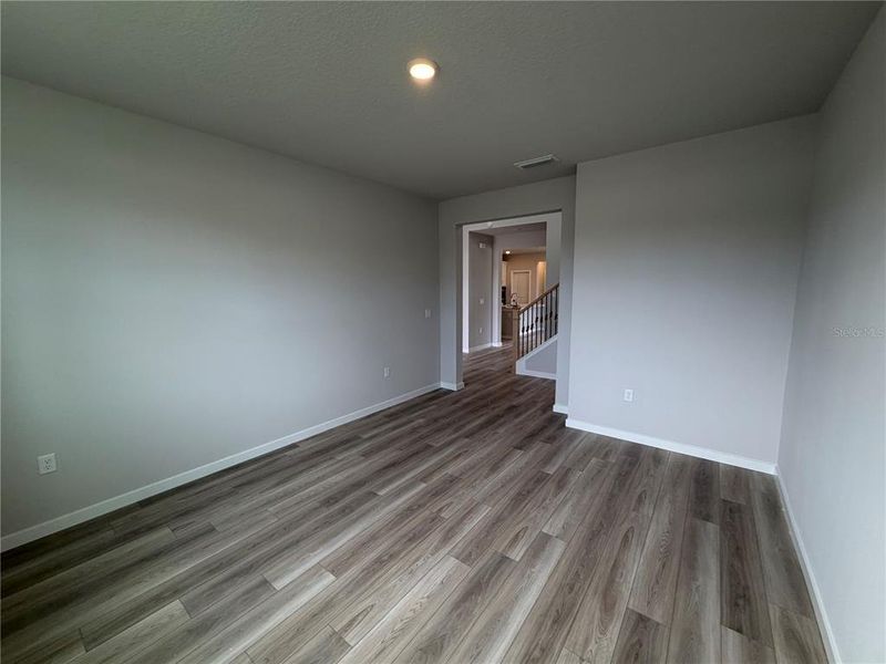 Spacious, unfurnished interior of a new home in The Cypress Series at Reserve East, Flagler Beach (Image 20).