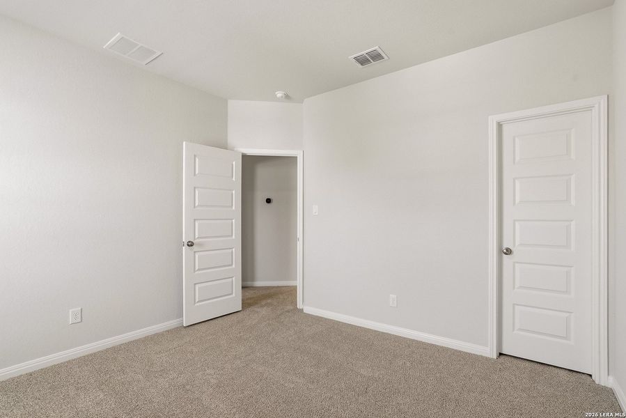 Spacious, unfurnished interior of a new home in Melissa Ranch, San Antonio (Image 13).