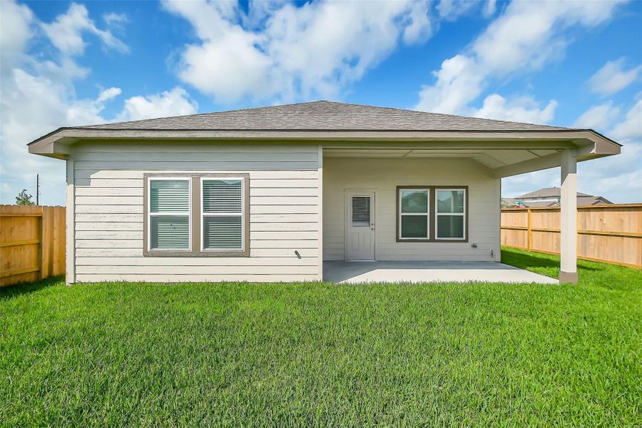 Front exterior of a new home in Emberly, Beasley, TX, highlighting curb appeal (Image 73).