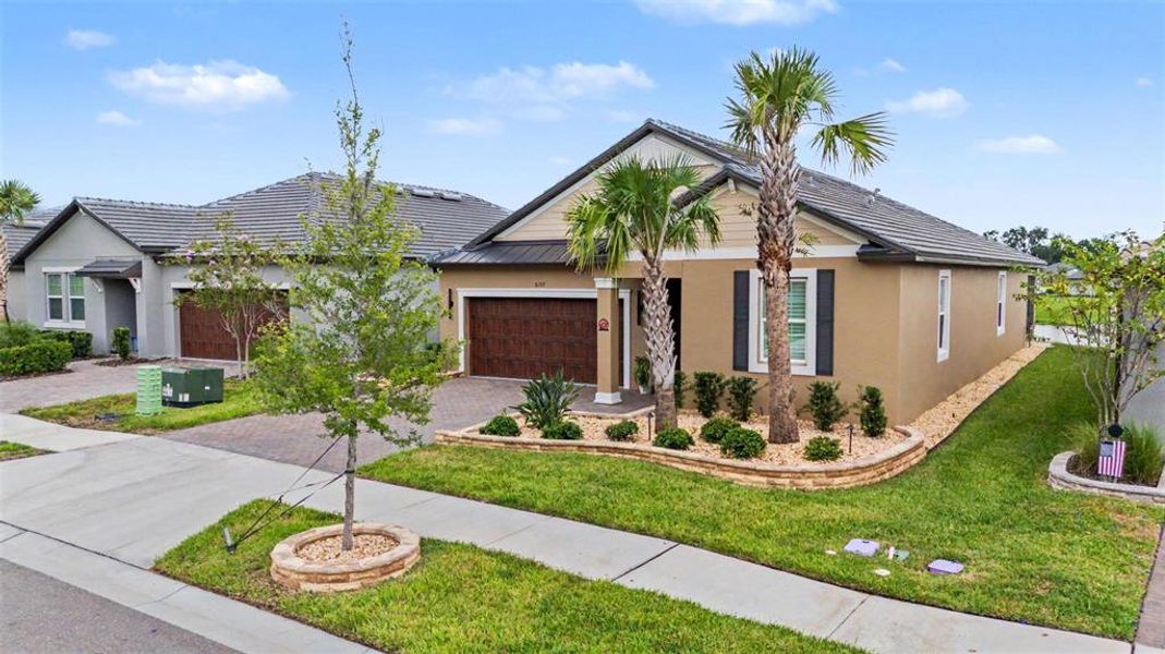 Front exterior of a new home in Mirada Active Adult, San Antonio, FL, highlighting curb appeal (Image 2). Front exterior of a new home in Mirada Active Adult, San Antonio, FL, highlighting curb appeal (Image 2).